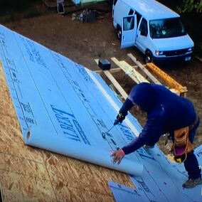 Installation of FelTex underlayment supplied by Talbert Building Supply on a roof, featured on Property Brothers show