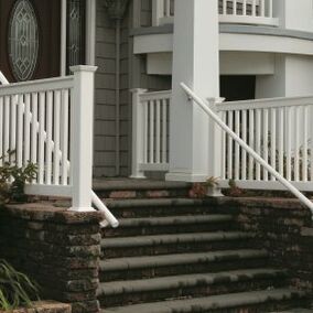 Secondary handrail from Carolina Vinyl installed on a front porch, providing safety and durability