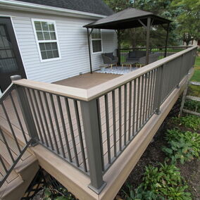 A deck featuring Keylink Chesapeake Series railing, installed with clean lines and a sleek design for a modern look