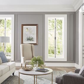 Living room scene featuring EastCoast Moulding with elegant trim and wall details