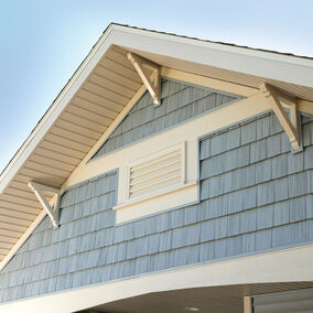 Image of home exterior featuring Fypon decorative louvers and gable vents