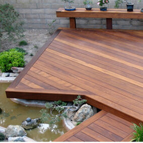 Ipe hardwood decking next to beautiful landscaping, showcasing natural resistance to rot and decay