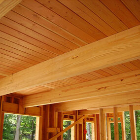 Interior construction with Anthony Glulam engineered wood beams, showcasing strong and durable wood framing